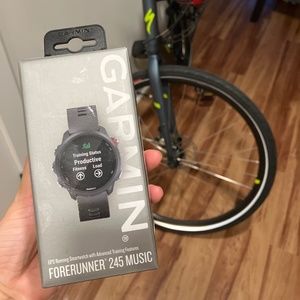 Brand new unopened Garmin 245 forerunner music smart watch